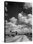 Cumulus Clouds Billowing over Texaco Gas Station along a Stretch of Highway US 66-Andreas Feininger-Stretched Canvas