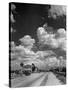 Cumulus Clouds Billowing over Texaco Gas Station along a Stretch of Highway US 66-Andreas Feininger-Stretched Canvas