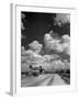 Cumulus Clouds Billowing over Texaco Gas Station along a Stretch of Highway US 66-Andreas Feininger-Framed Photographic Print