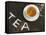 Cup of Black Tea, Surrounded by Tea Leaves with the Word Tea-null-Framed Stretched Canvas