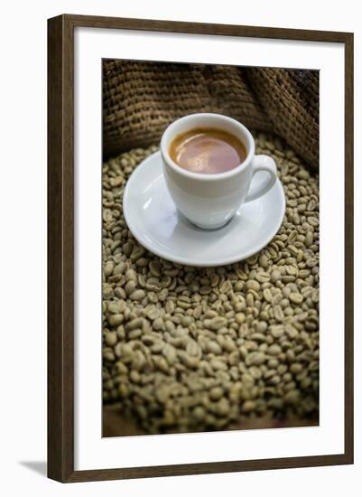 Cup of Espresso on a Sack with Unroasted Coffee Beans-Bernd Wittelsbach-Framed Photographic Print