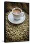 Cup of Espresso on a Sack with Unroasted Coffee Beans-Bernd Wittelsbach-Framed Stretched Canvas