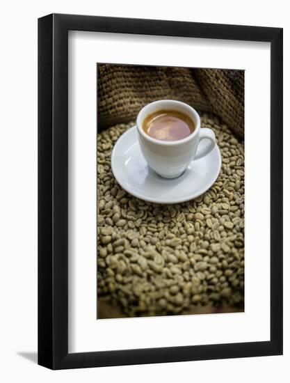 Cup of Espresso on a Sack with Unroasted Coffee Beans-Bernd Wittelsbach-Framed Photographic Print