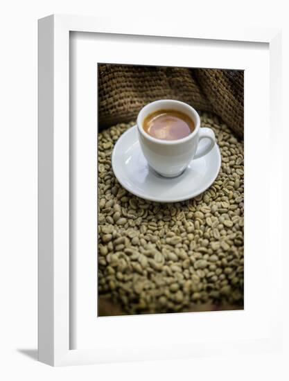 Cup of Espresso on a Sack with Unroasted Coffee Beans-Bernd Wittelsbach-Framed Photographic Print