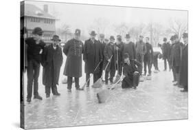 Curling in Central Park with Men Having Brooms at the Ready over the Ice.-null-Stretched Canvas