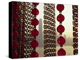 Curtain of Chinese New Year Decorations Frame Victoria Harbour from Tsim Sha Tsui, in Hong Kong-Andrew Watson-Stretched Canvas