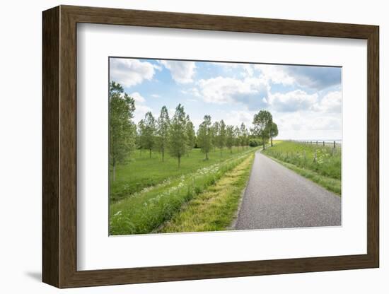 Curved Country Road along A Dutch Dike-Ruud Morijn-Framed Photographic Print