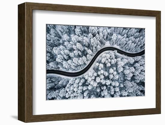 Curvy Windy Road in Snow Covered Forest, Top down Aerial View.-null-Framed Photographic Print