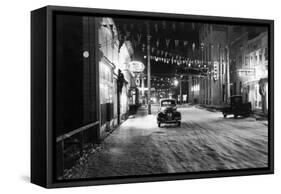 Cushman Street with Snow and Cars - Fairbanks, AK-Lantern Press-Framed Stretched Canvas