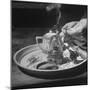 Customer Cooking Up the Opium to Prepare It For Smoking-George Lacks-Mounted Premium Photographic Print