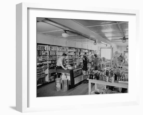 Customers Buying Supplies at Local Store-null-Framed Photographic Print