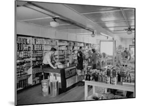 Customers Buying Supplies at Local Store-null-Mounted Photographic Print