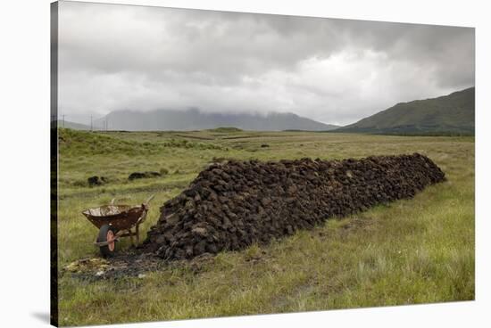 Cut Peat Stacked up for Winter, Connemara, County Galway, Connacht, Republic of Ireland-Gary Cook-Stretched Canvas