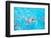 Cute Little Baby Swimming Underwater from Mother to Father in a Pool, Learning to Swim Lessons and-FamVeld-Framed Photographic Print