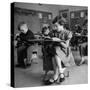 Cute Little Girl Busily at Work, Sitting in a Desk Chair in a Schoolroom, Other Pupils at Work Too-Gordon Parks-Stretched Canvas