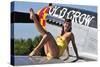 Cute Pin-Up Girl Sitting on the Wing of a P-51 Mustang-null-Stretched Canvas
