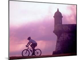 Cycling at El Morro in Old San Juan at Sunset, Puerto Rico-Greg Johnston-Mounted Premium Photographic Print