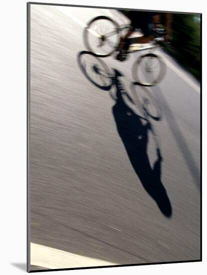Cyclist and His Shadow-Chris Trotman-Mounted Photographic Print