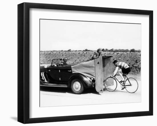 Cyclist Training Behind an Auburn Car, C1935-null-Framed Premium Photographic Print