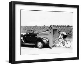 Cyclist Training Behind an Auburn Car, C1935-null-Framed Premium Photographic Print