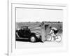 Cyclist Training Behind an Auburn Car, C1935-null-Framed Photographic Print