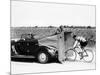 Cyclist Training Behind an Auburn Car, C1935-null-Mounted Photographic Print