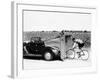 Cyclist Training Behind an Auburn Car, C1935-null-Framed Photographic Print