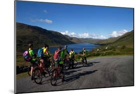 Cyclists Above Lough Nafooey, Shot from the County Mayo Side of the Border-null-Mounted Photographic Print