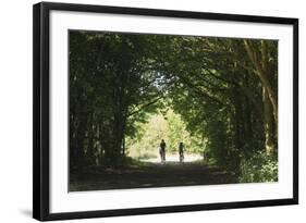 Cyclists Tunnel-Charles Bowman-Framed Photographic Print