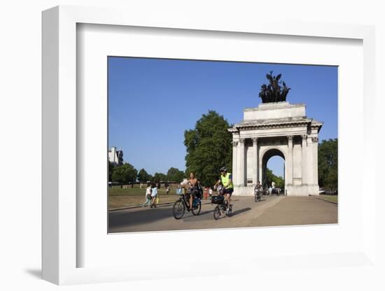 Cyclists under the Wellington Arch, Hyde Park Corner, London, England, United Kingdom, Europe-Stuart Black-Framed Photographic Print