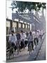 Cyclists, Vietnam, Indochina, Southeast Asia-Tim Hall-Mounted Photographic Print