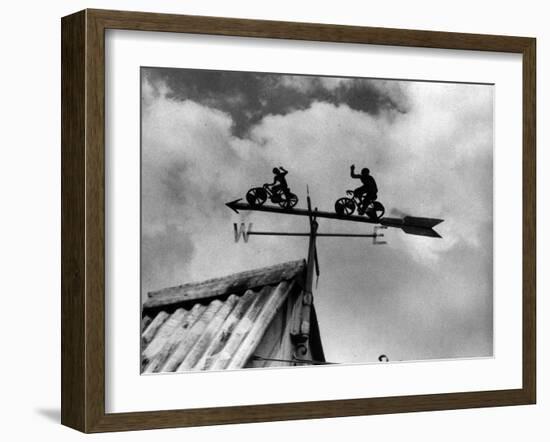 Cyclists Weathervane-null-Framed Photographic Print