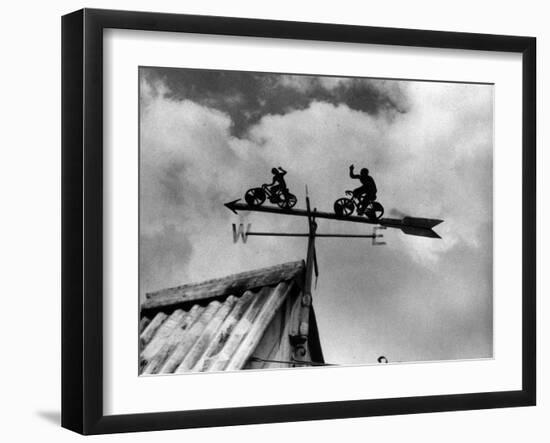 Cyclists Weathervane-null-Framed Photographic Print