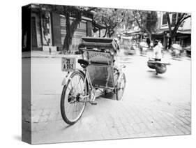 Cyclo in Old Hanoi, Vietnam-Walter Bibikow-Stretched Canvas