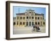 Cyclo Passing the Old Post Office in Phnom Penh in Cambodia, Indochina, Southeast Asia-Tim Hall-Framed Photographic Print