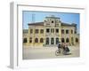 Cyclo Passing the Old Post Office in Phnom Penh in Cambodia, Indochina, Southeast Asia-Tim Hall-Framed Photographic Print