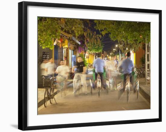 Cyclos and Bicycles on Street at Dusk, Hoi An, Quang Nam, Vietnam, Indochina, Southeast Asia, Asia-Ian Trower-Framed Photographic Print