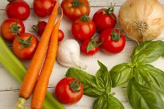 A Colorful Array of Fresh Garden Veggies Sit on a Rustic White Farm Table-Cynthia Classen-Photographic Print