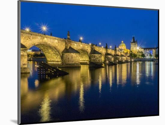 Czech Republic, Prague. Charles bridge water reflection at night.-Julie Eggers-Mounted Photographic Print