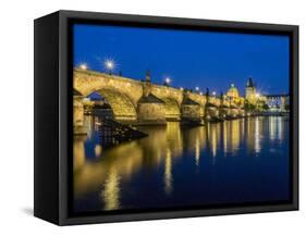 Czech Republic, Prague. Charles bridge water reflection at night.-Julie Eggers-Framed Stretched Canvas