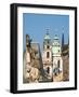 Czech Republic, Prague. Statue on the Charles bridge and spires of old town.-Julie Eggers-Framed Photographic Print