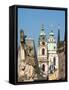 Czech Republic, Prague. Statue on the Charles bridge and spires of old town.-Julie Eggers-Framed Stretched Canvas