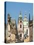 Czech Republic, Prague. Statue on the Charles bridge and spires of old town.-Julie Eggers-Stretched Canvas