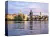 Czech Republic, Prague. Town bridge and clock tower on the Vltava river.-Julie Eggers-Stretched Canvas