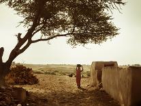 A Rajasthani Woman Carries Her Things on Her Head in a Small Village in Western Rajasthan-D. Scott Clark-Photographic Print