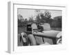 Dachshund sitting on the bonnet of Charles Mortimers Bentley, c1930s-Bill Brunell-Framed Photographic Print