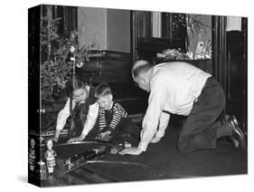 Dad Plays with the Kids on Christmas Morning, Ca. 1950-null-Stretched Canvas