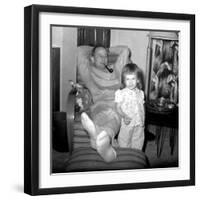 Dad Relaxes and Smokes His Pipe with His Four Year Old Daughter, Ca. 1958-null-Framed Photographic Print