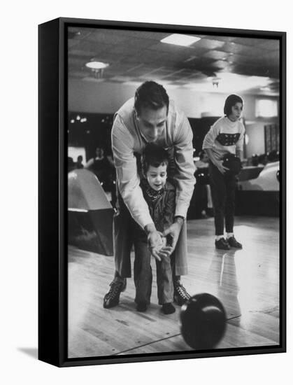 Dad Showing 3 Year Old Daughter the Basics of Bowling-George Silk-Framed Stretched Canvas