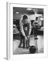 Dad Showing 3 Year Old Daughter the Basics of Bowling-George Silk-Framed Photographic Print